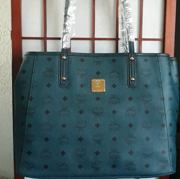 MCM Handbags - (New) MCM Reversible Tote & Pouch Set